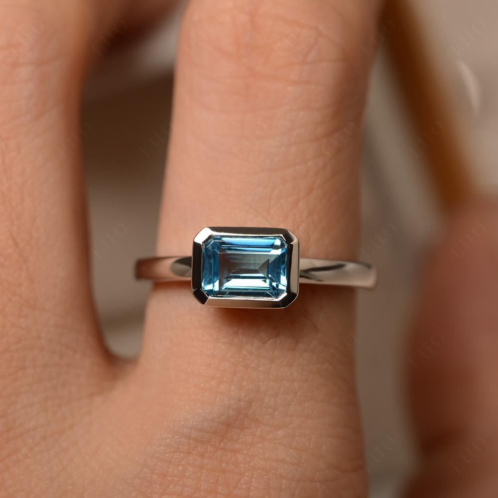 East West Emerald Cut Swiss Blue Topaz Bezel Ring - LUO Jewelry