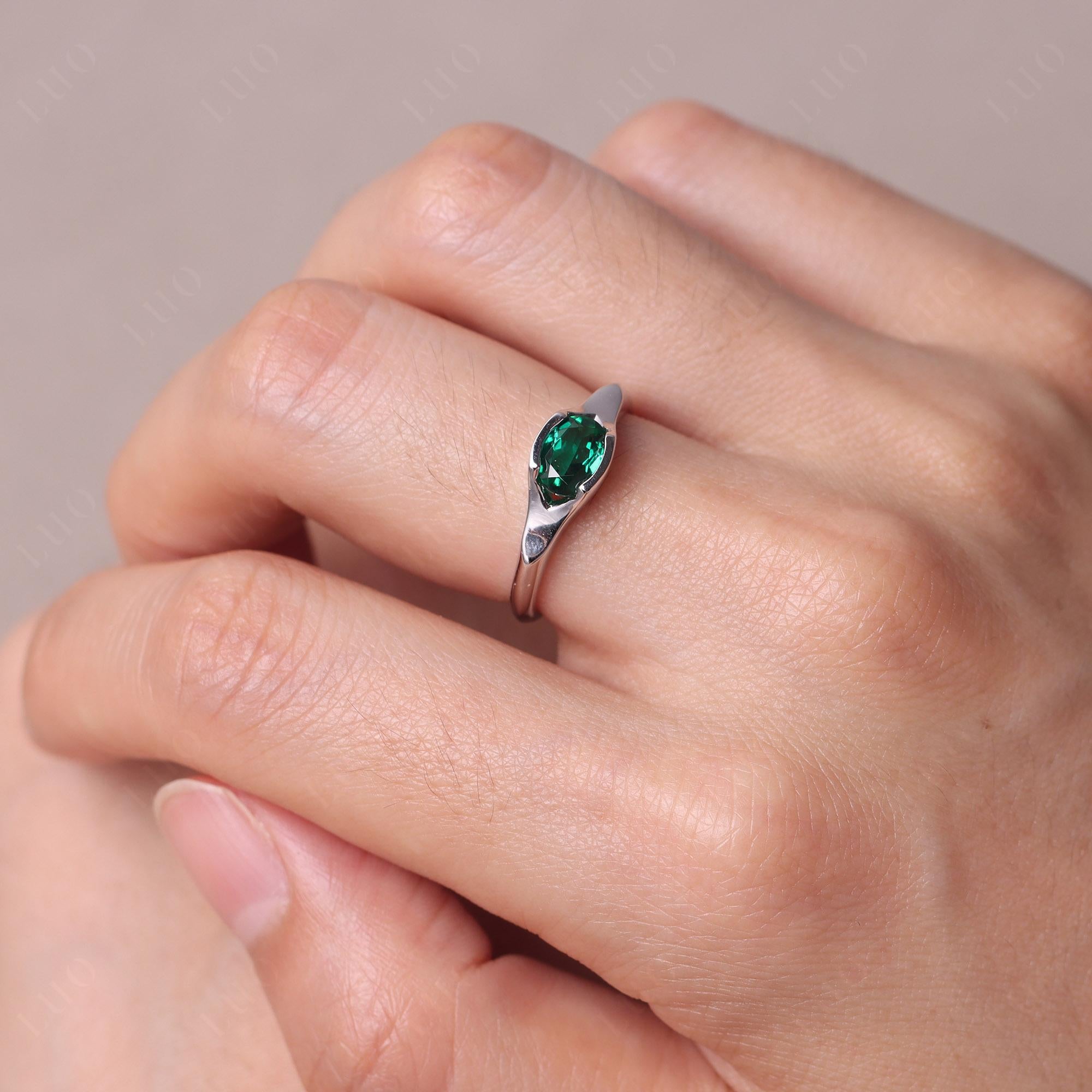 Oval Emerald East West Bezel Set Ring - LUO Jewelry