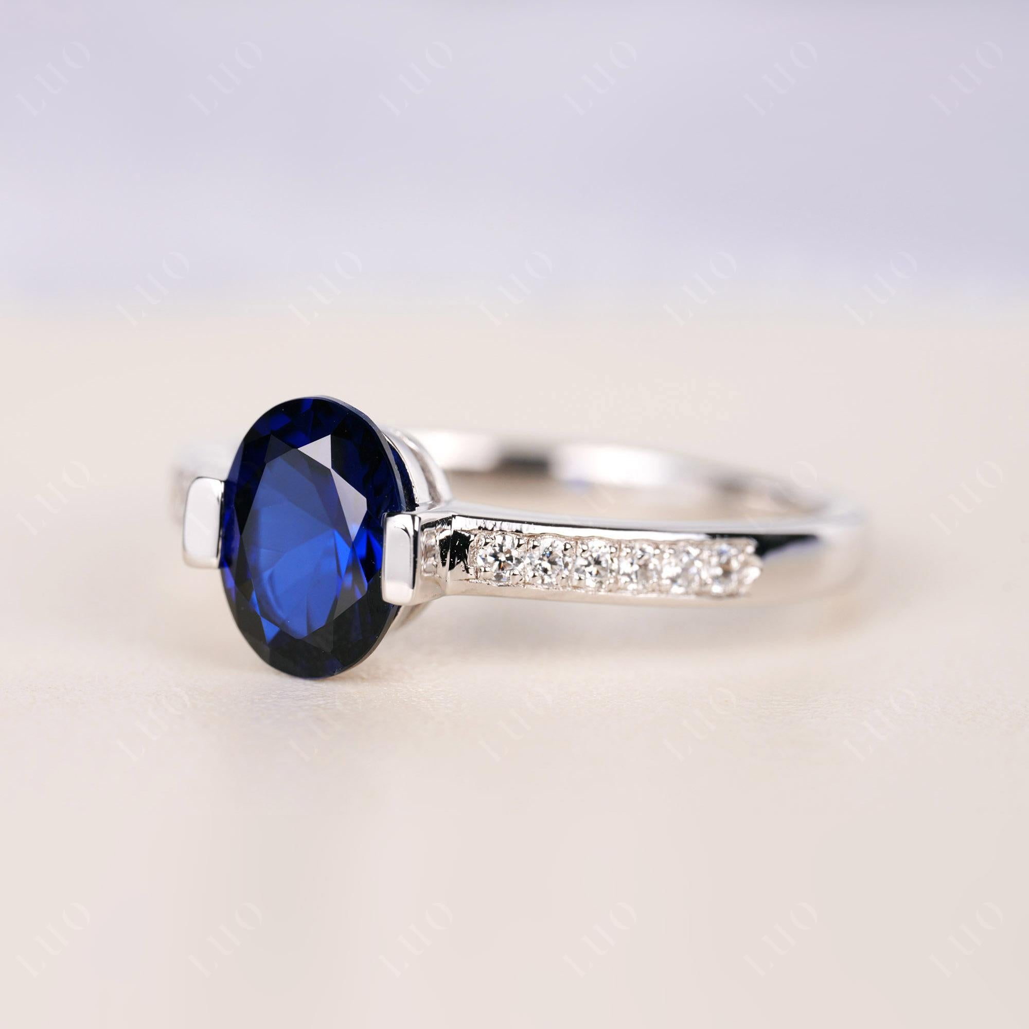 Oval Sapphire Engagement Ring Half Bezel Set | LUO Jewelry