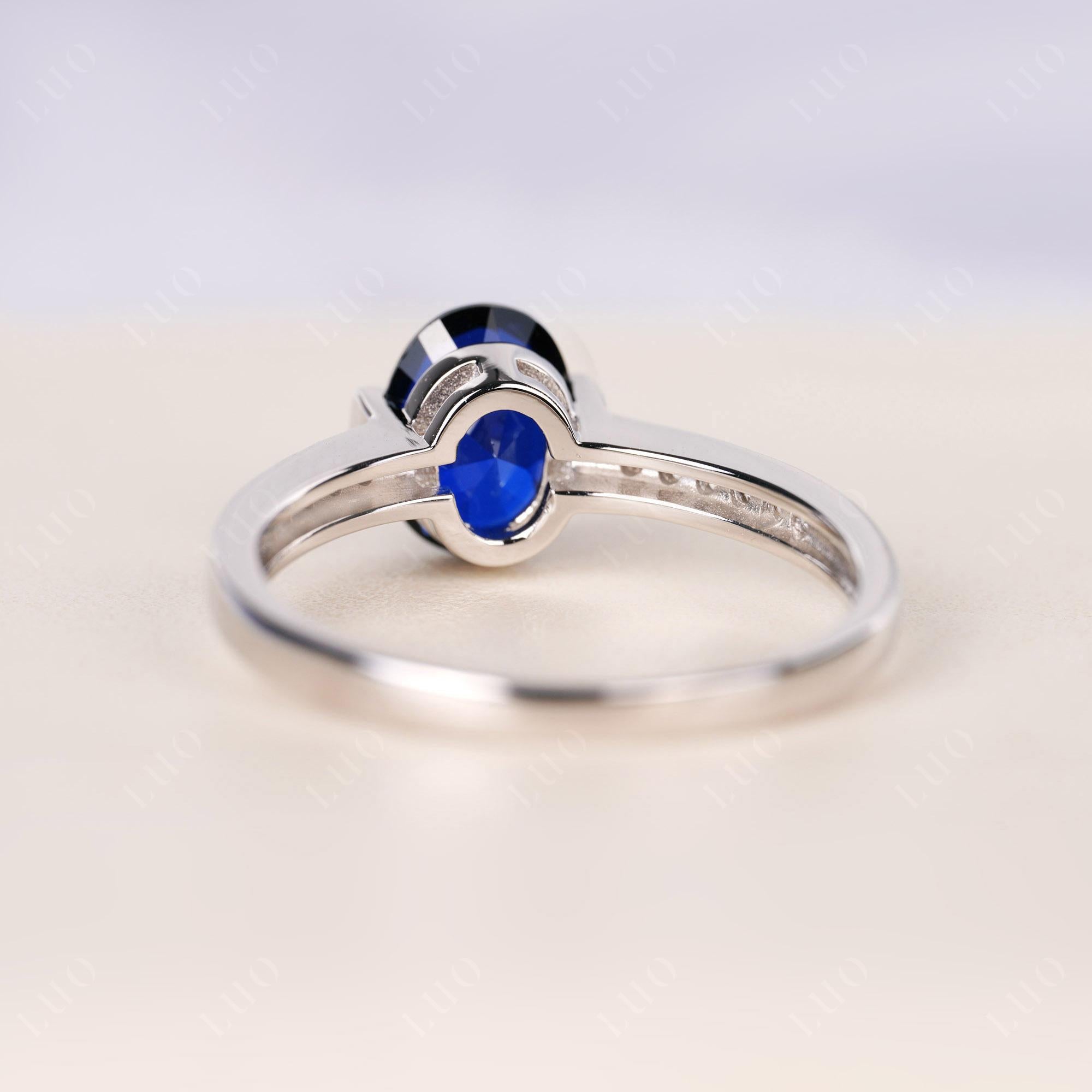Oval Sapphire Engagement Ring Half Bezel Set | LUO Jewelry