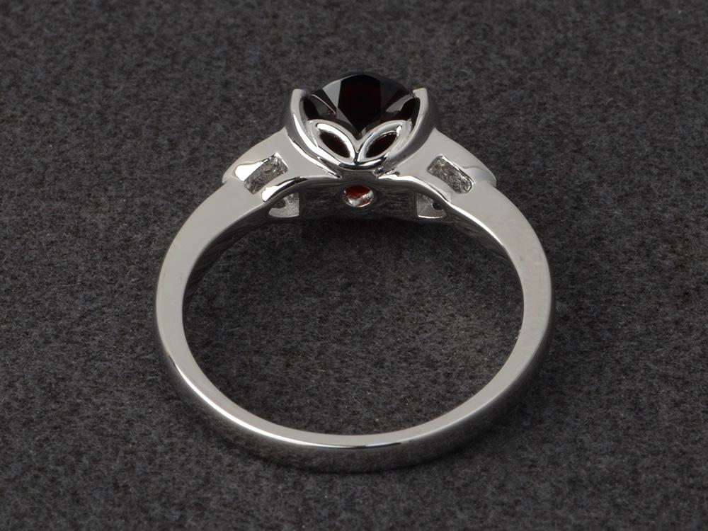 Oval Garnet Half Bezel Set Ring | LUO Jewelry