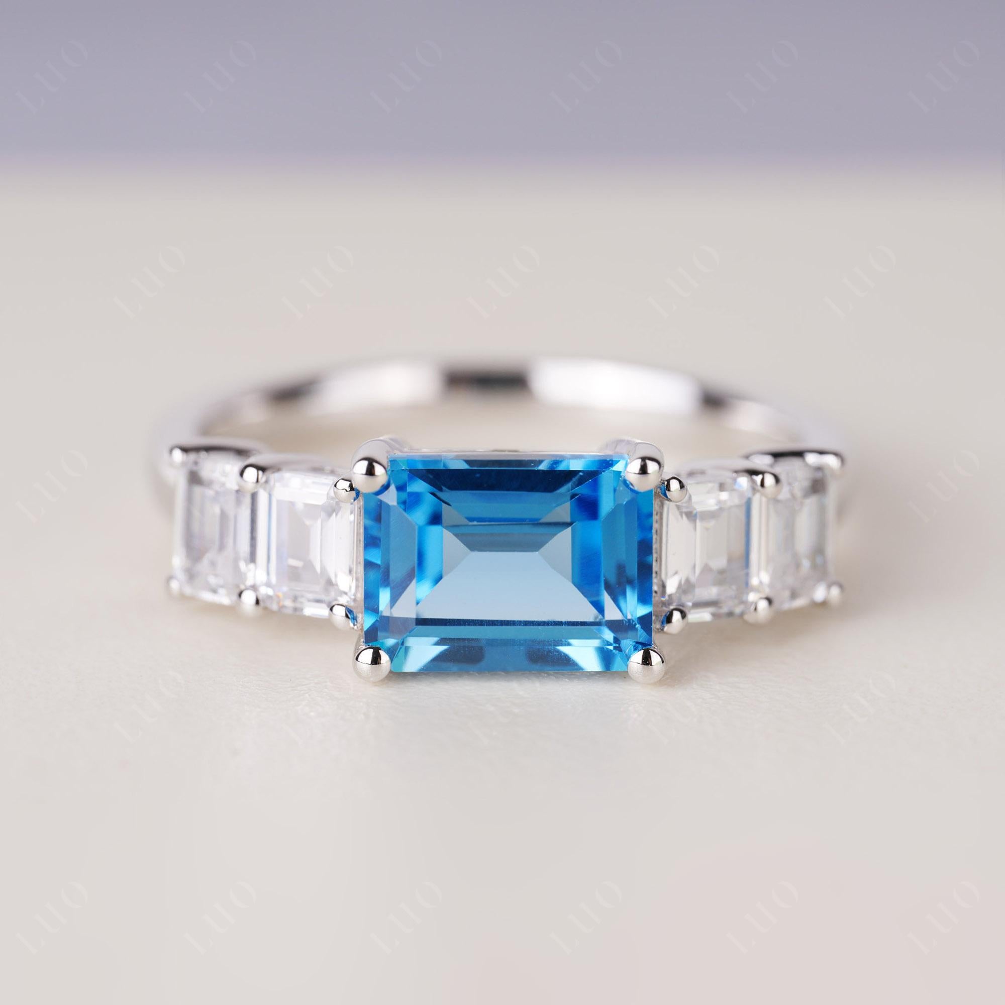 East West Emerald Cut Swiss Blue Topaz Ring | LUO Jewelry