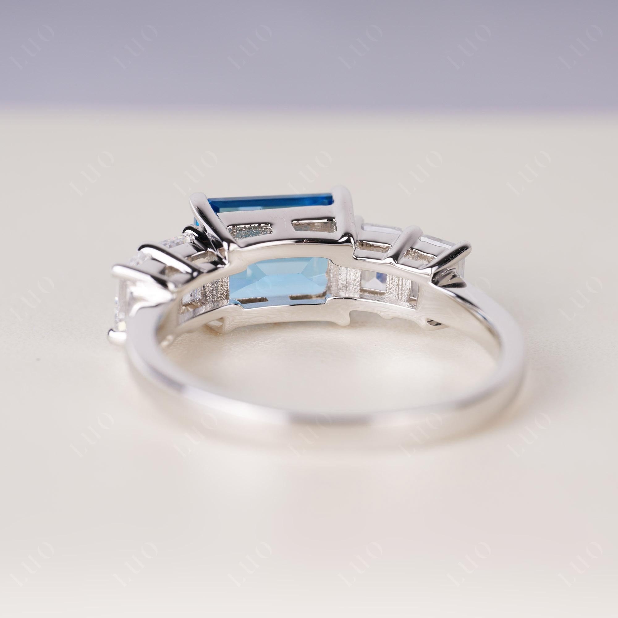 East West Emerald Cut Swiss Blue Topaz Ring | LUO Jewelry