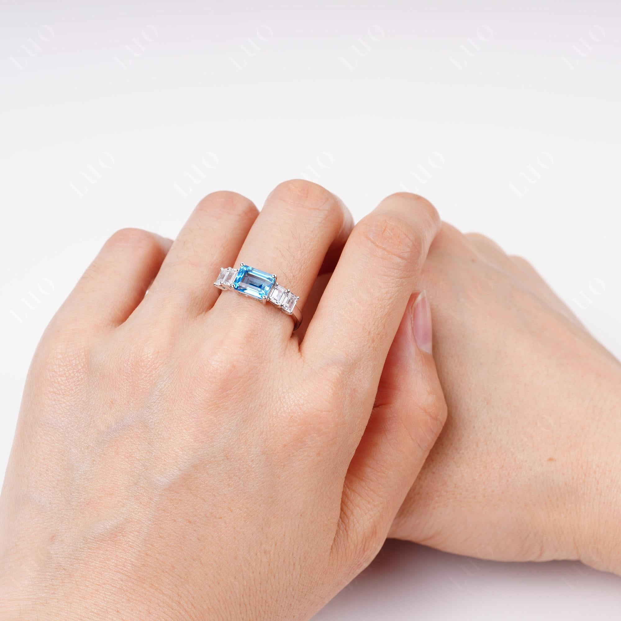 East West Emerald Cut Swiss Blue Topaz Ring | LUO Jewelry