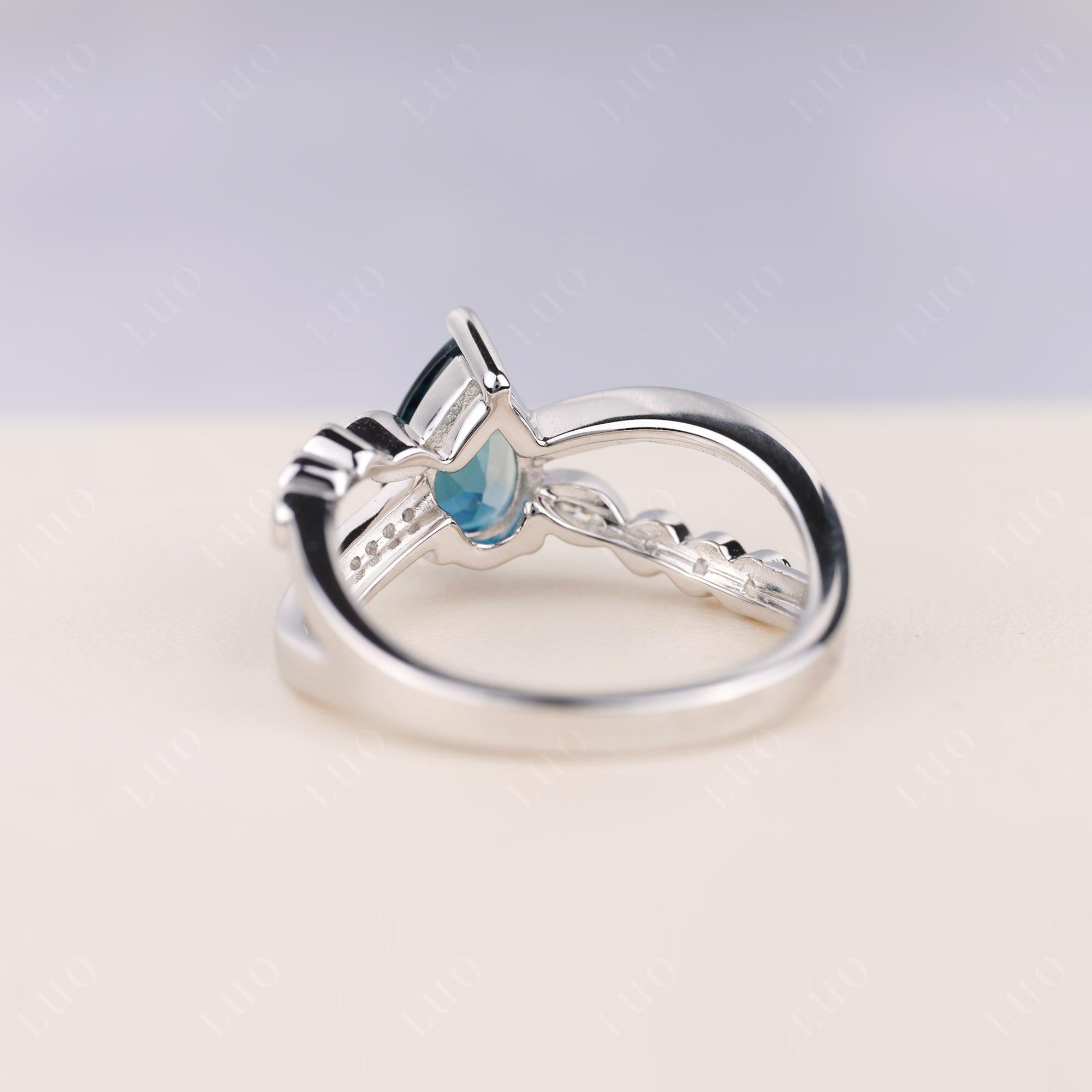 Pear Shaped London Blue Topaz Crossover Ring - LUO Jewelry