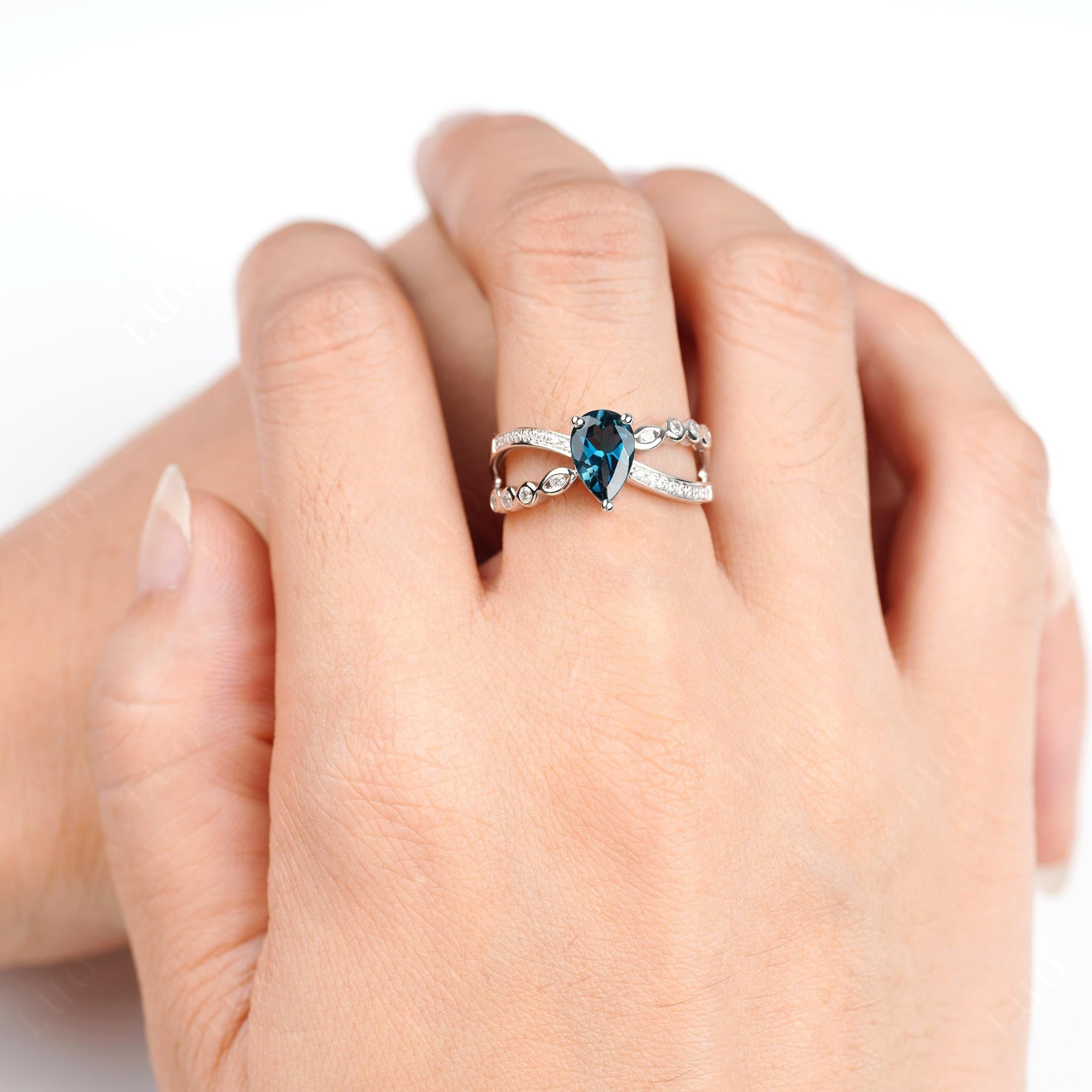 Pear Shaped London Blue Topaz Crossover Ring - LUO Jewelry