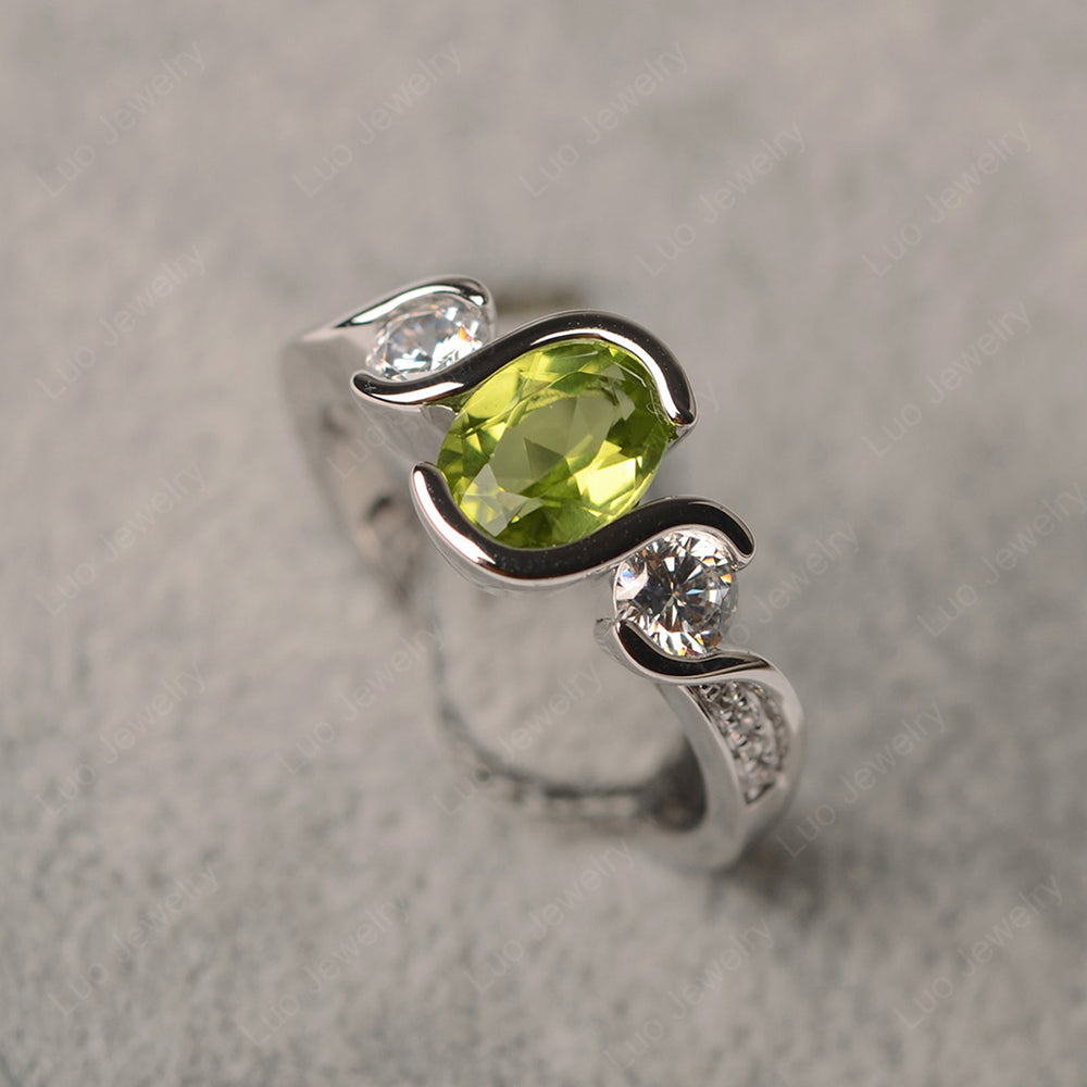 Oval Cut Peridot Bezel Set Ring Yellow Gold - LUO Jewelry