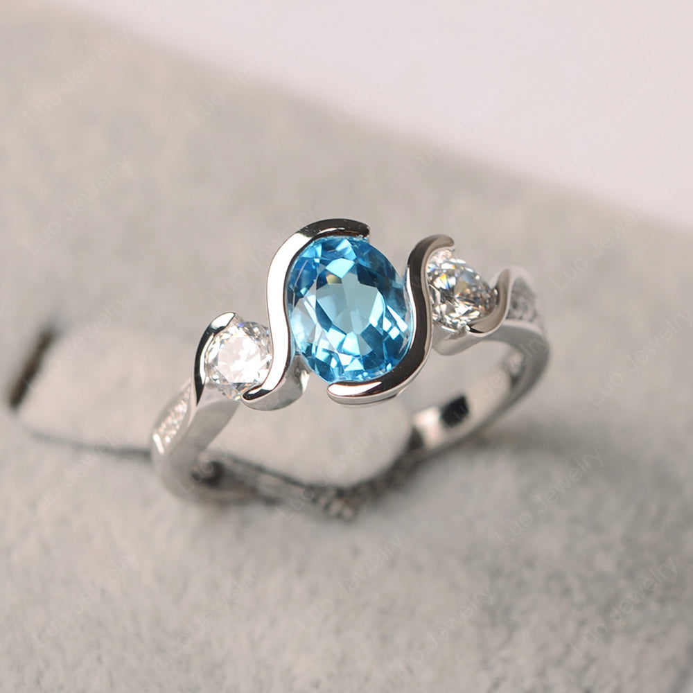 Oval Cut Swiss Blue Topaz Bezel Set Ring Yellow Gold - LUO Jewelry