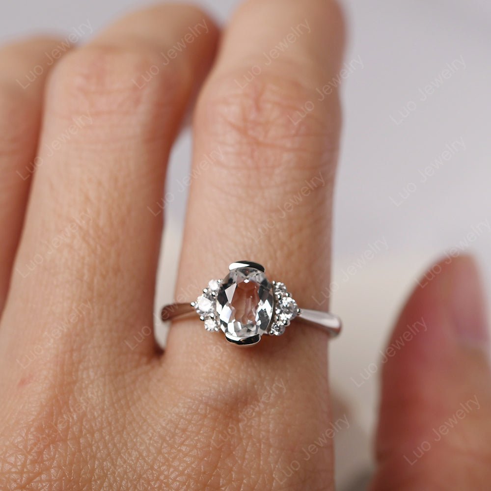 Oval Half Bezel Set White Topaz Engagement Ring - LUO Jewelry