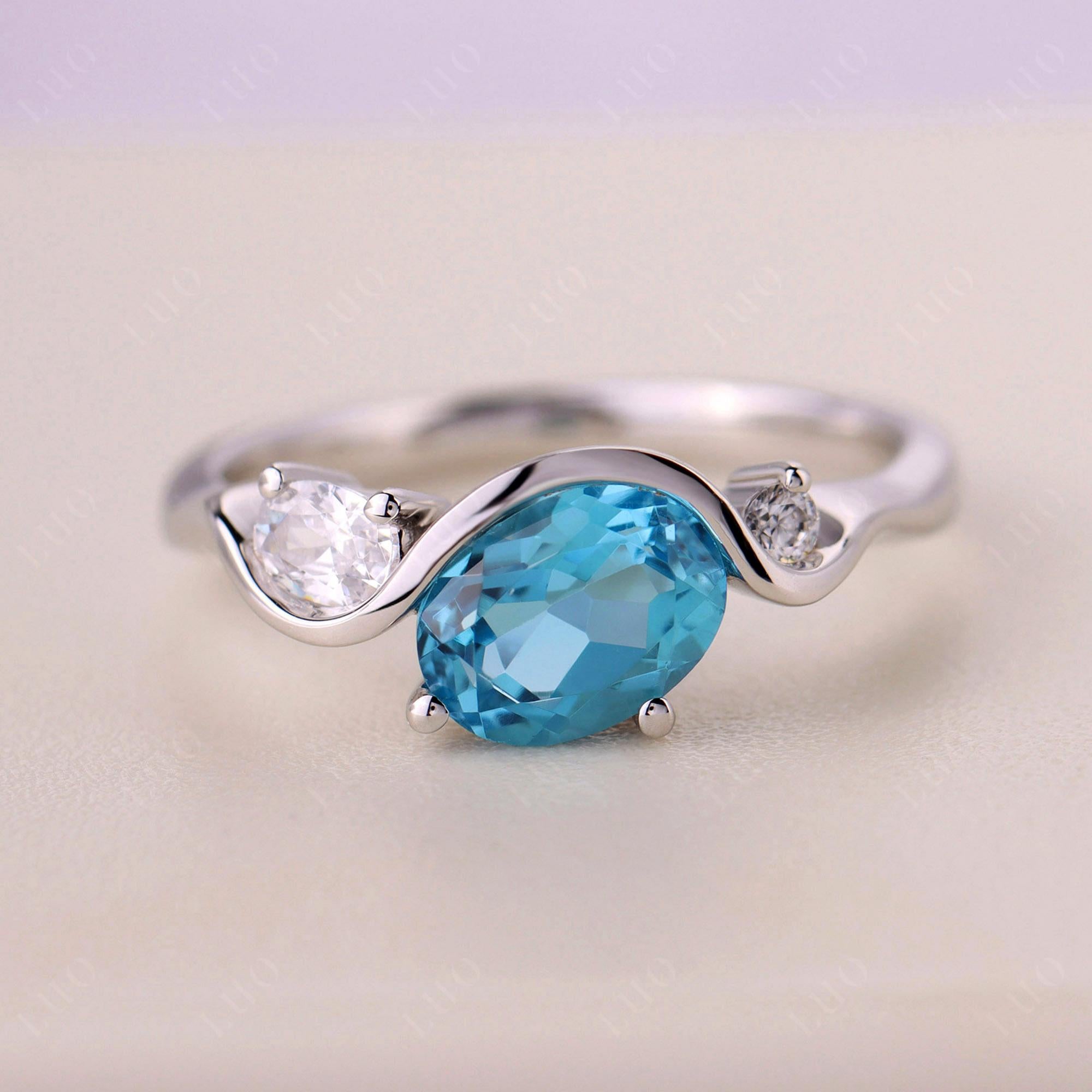 Wave Oval Swiss Blue Topaz Engagement Ring - LUO Jewelry