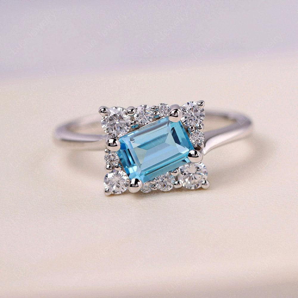 Emerald Cut Swiss Blue Topaz Halo Ring