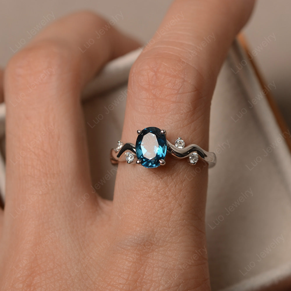 Oval Eccentric London Blue Topaz Ring Yellow Gold - LUO Jewelry