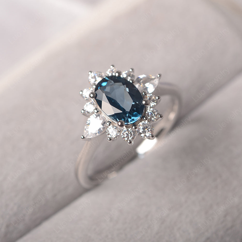 Oval Cut London Blue Topaz Ring With Pear Side Stone - LUO Jewelry