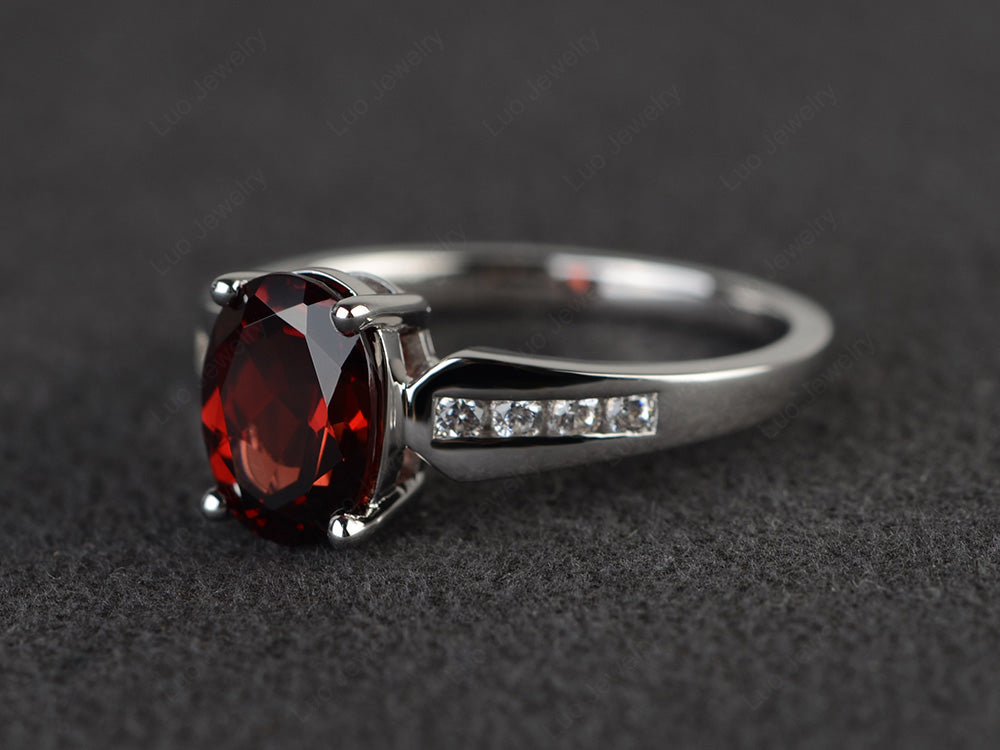 Oval Cut Garnet Ring With Channel Set Band - LUO Jewelry