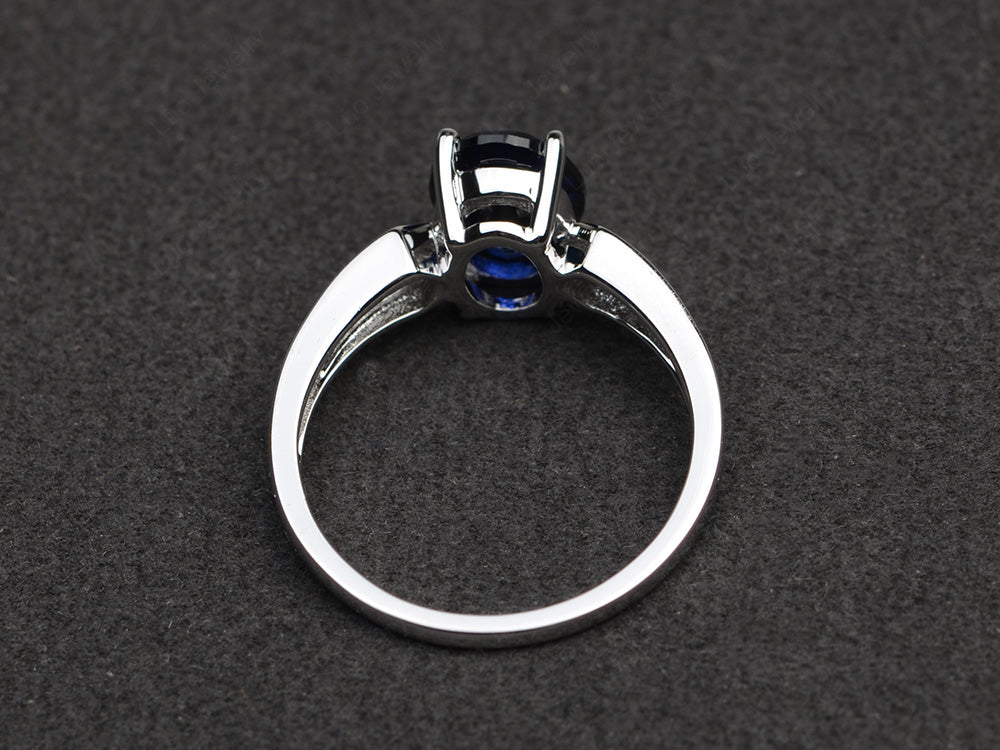 Oval Cut Lab Sapphire Ring With Channel Set Band - LUO Jewelry