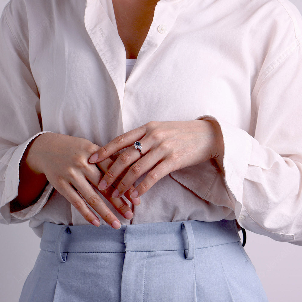 Birnenförmiger Cluster London Blue Topaz Mutterring