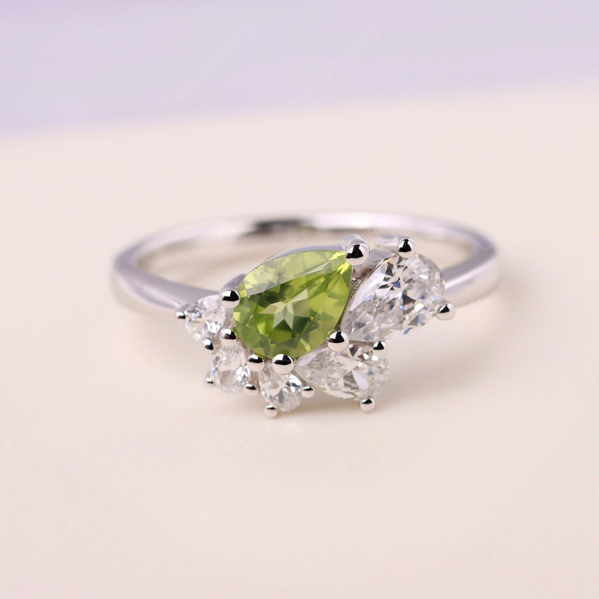 Pear Shaped Cluster Peridot Mothers Ring