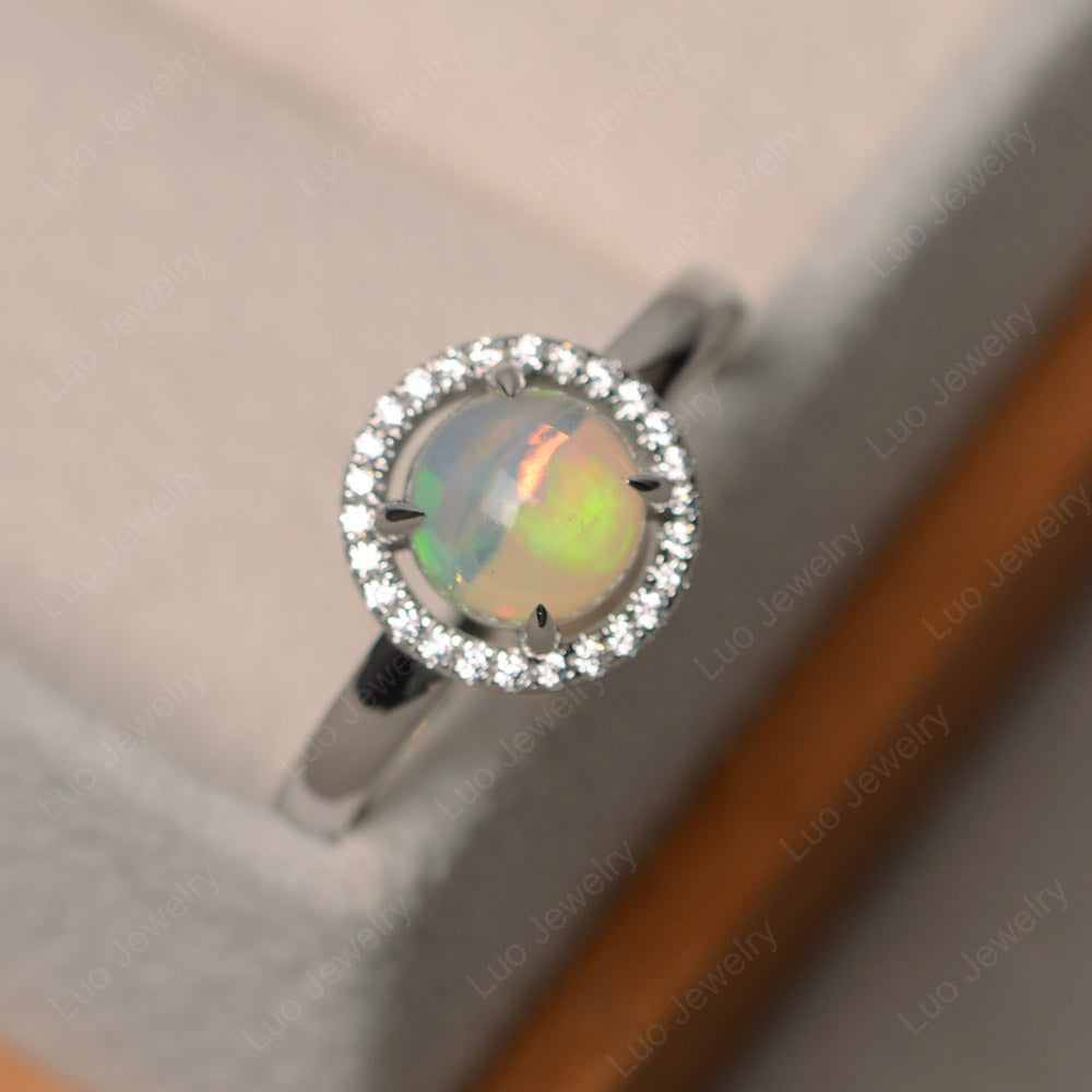 Opal Cabochon Halo Ring