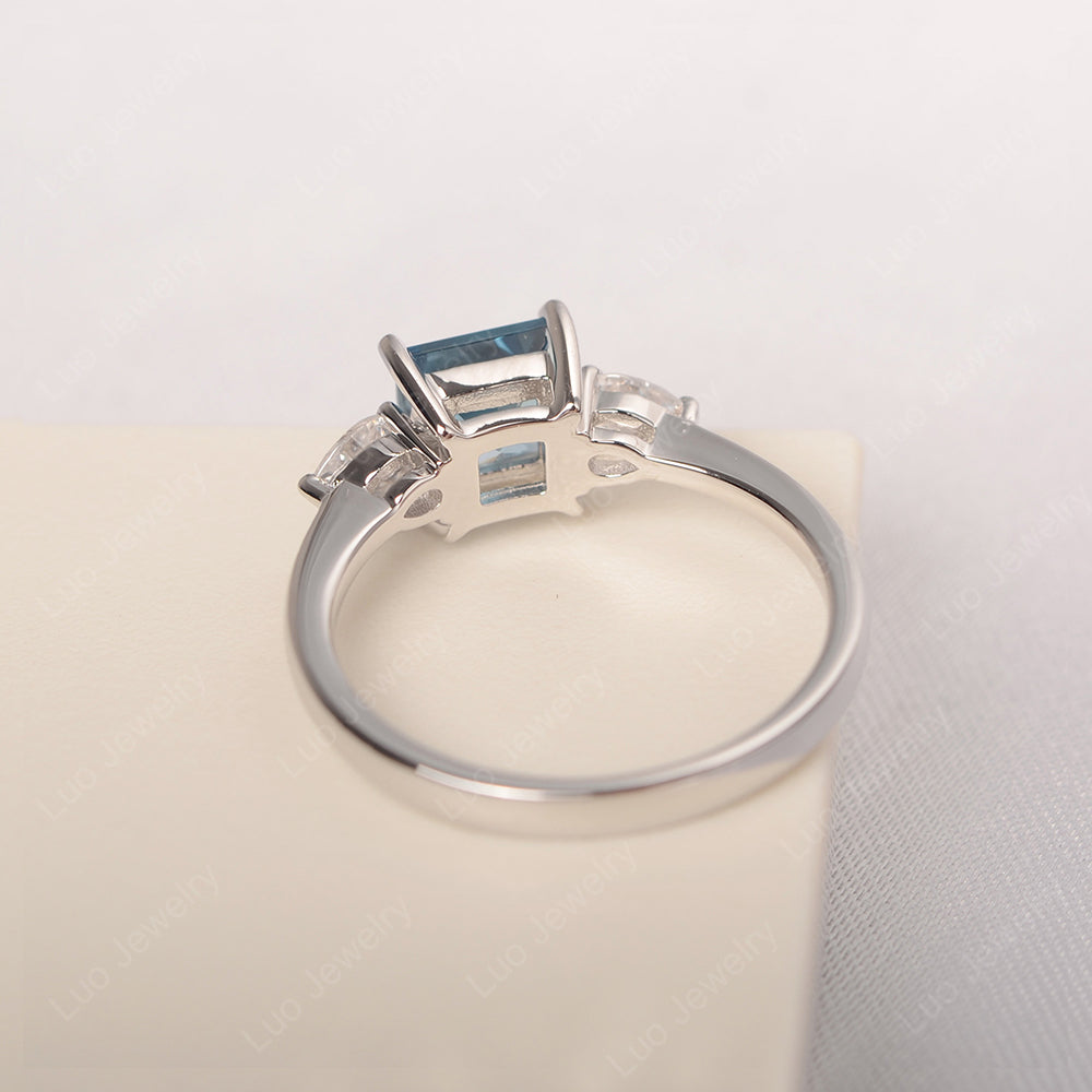 Princess Cut London Blue Topaz Ring With Pear Side Stone - LUO Jewelry