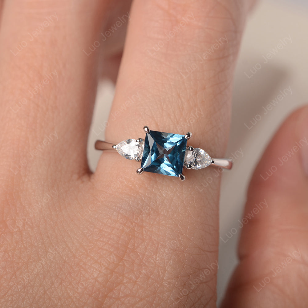 Princess Cut London Blue Topaz Ring With Pear Side Stone - LUO Jewelry