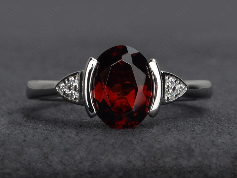 Oval Garnet Half Bezel Set Ring | LUO Jewelry