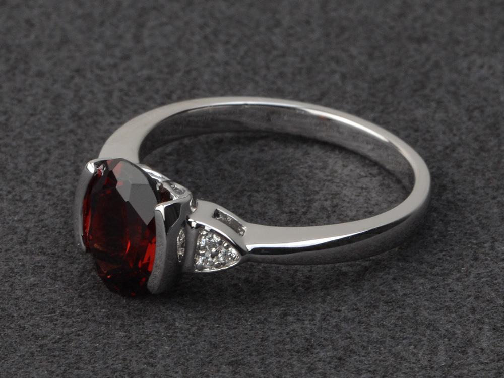 Oval Garnet Half Bezel Set Ring | LUO Jewelry