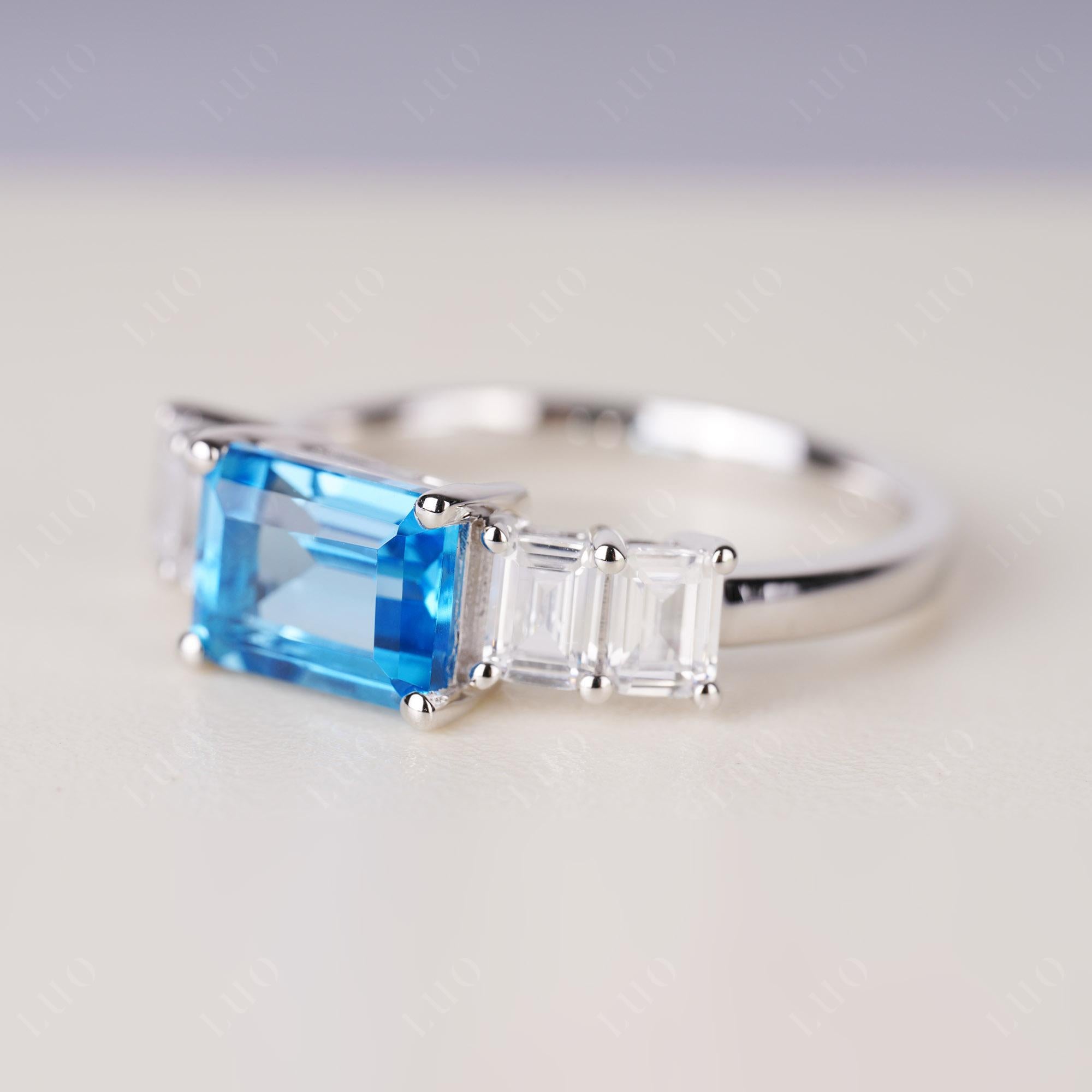 East West Emerald Cut Swiss Blue Topaz Ring | LUO Jewelry