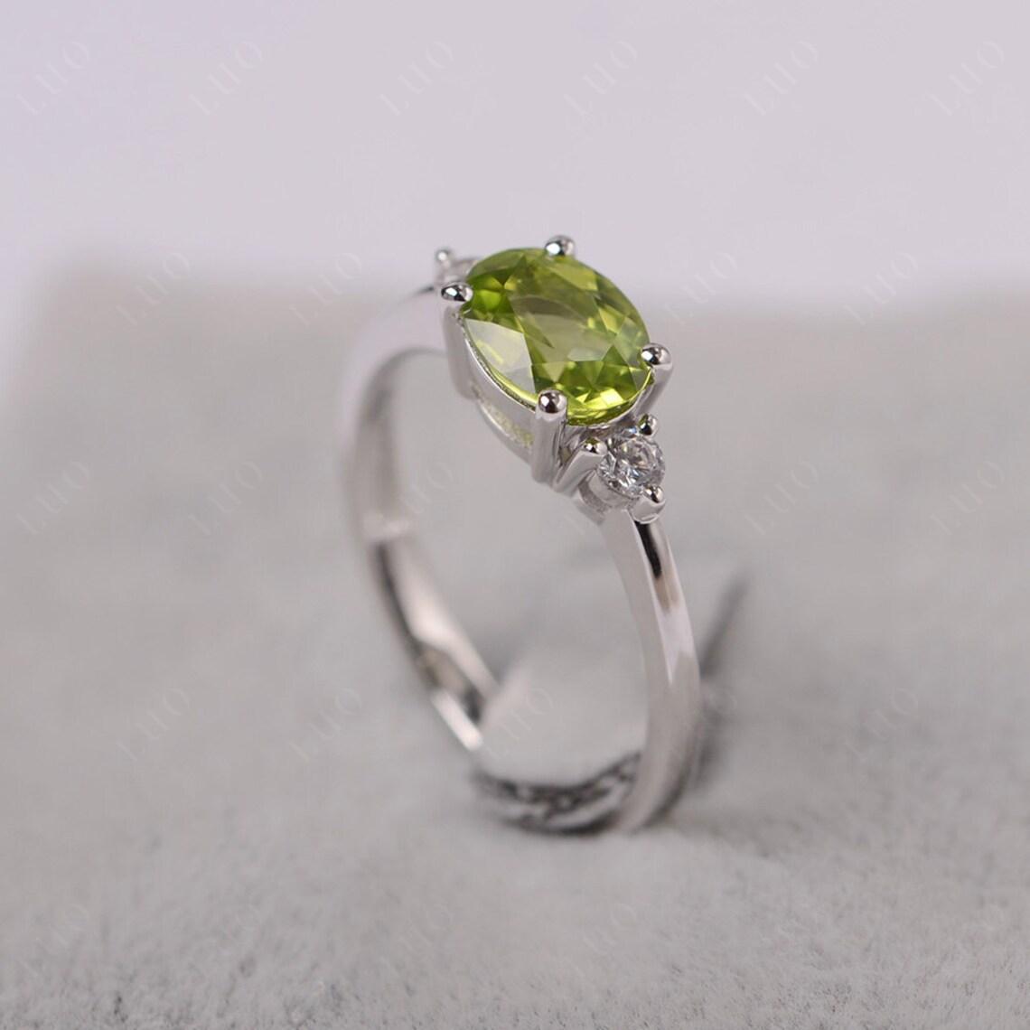 Oval East West Peridot Trilogy Ring - LUO Jewelry 