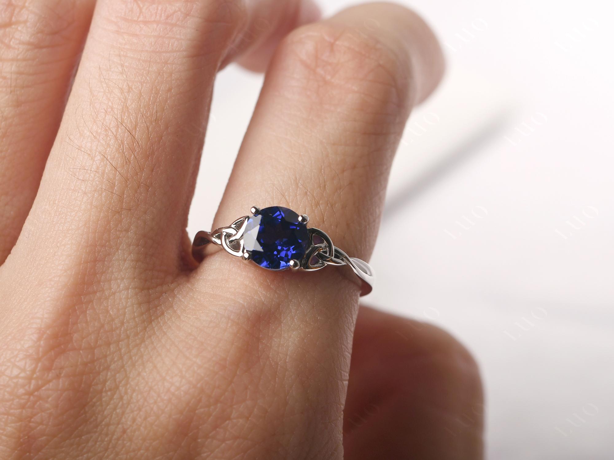 Silverspeck Celtic Knot Blue Created Sapphire Hoop Earrings – .52 TCW, 20mm, Sterling Silver, Lab-Created Oval Gemstone
