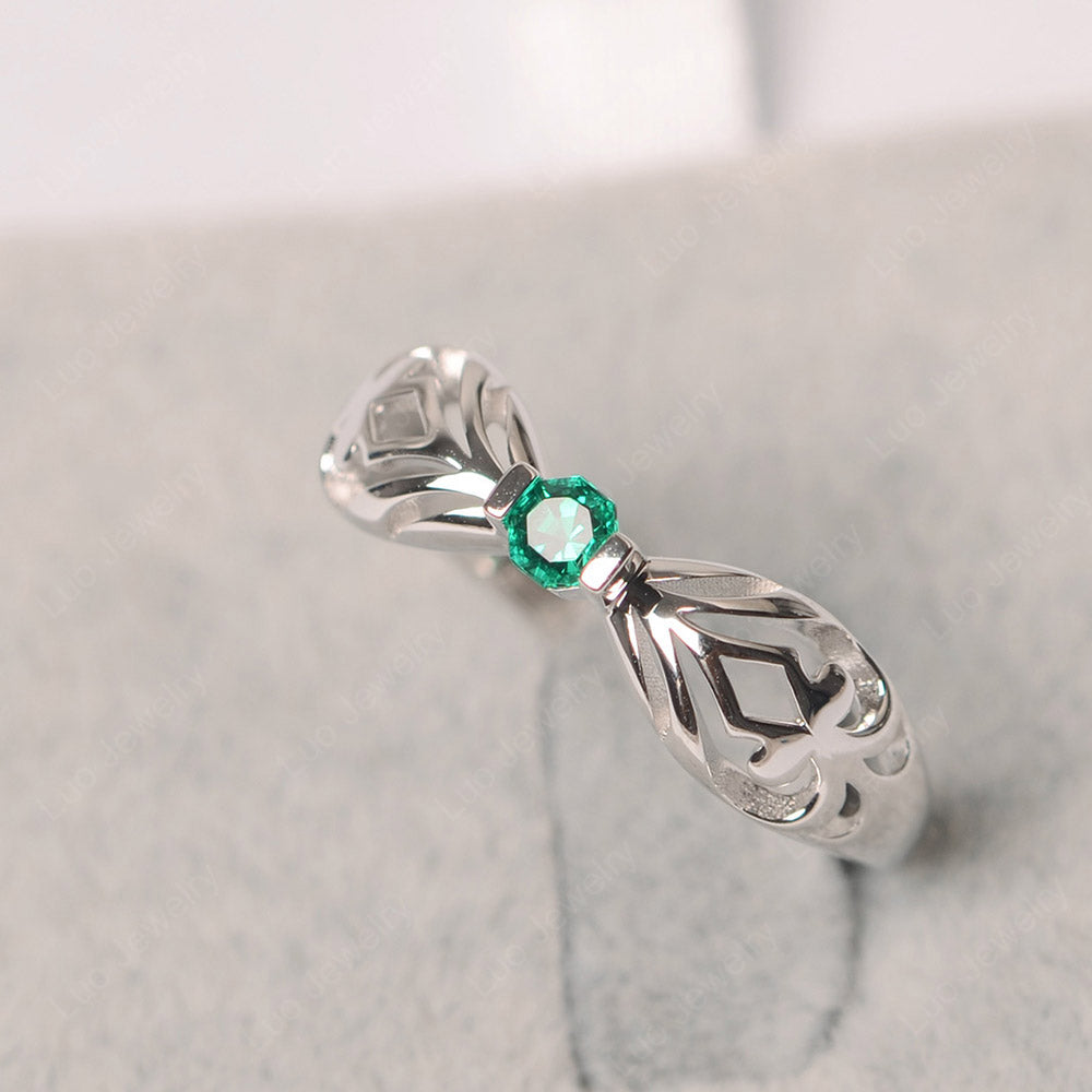 Charm Pattern Solitaire Octagon Cut Emerald Ring