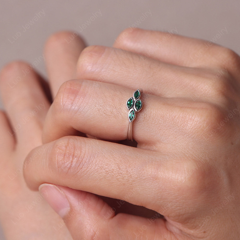 Marquise Cut Emerald Bezel Cluster Ring