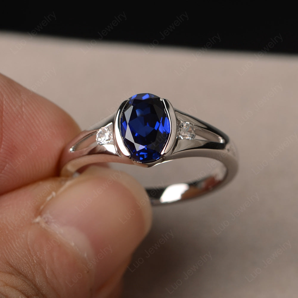 Half Bezel Set Oval Lab Sapphire Engagement Ring - LUO Jewelry