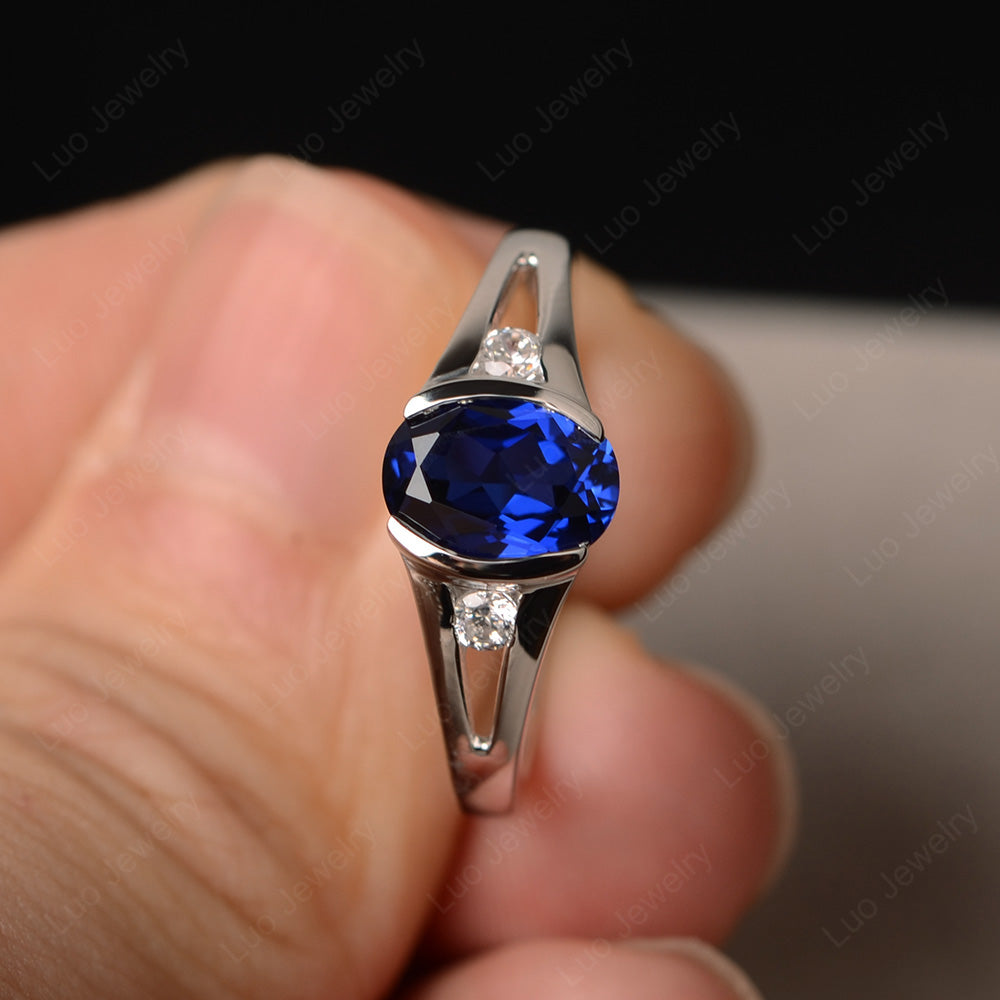 Half Bezel Set Oval Lab Sapphire Engagement Ring - LUO Jewelry