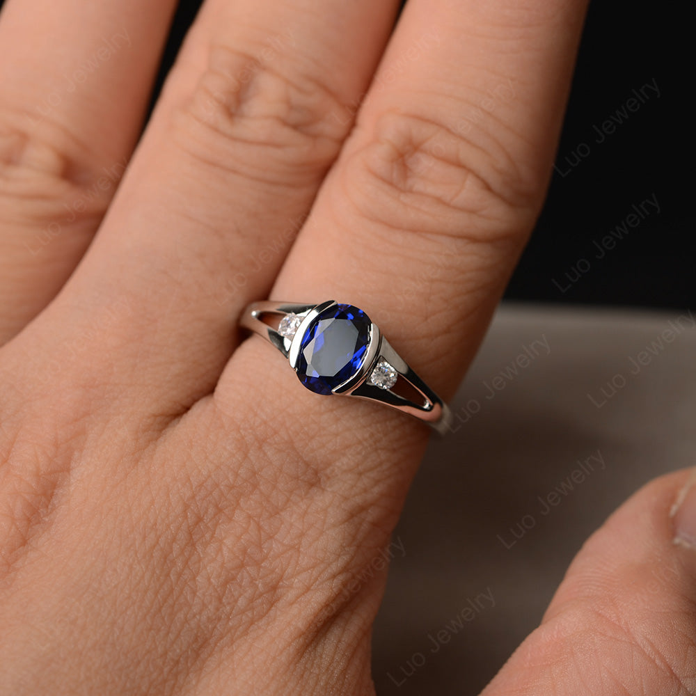Half Bezel Set Oval Lab Sapphire Engagement Ring - LUO Jewelry