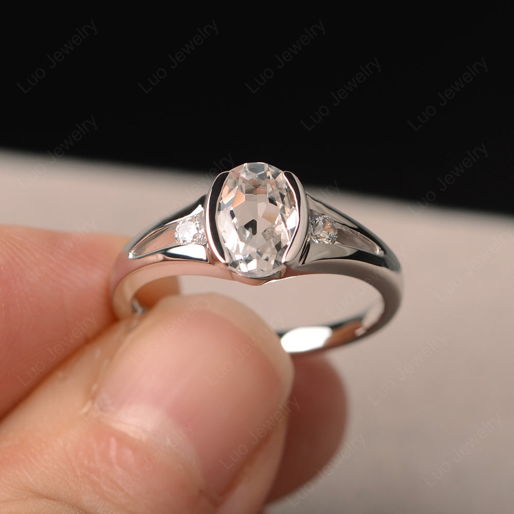 Half Bezel Set Oval White Topaz Engagement Ring - LUO Jewelry