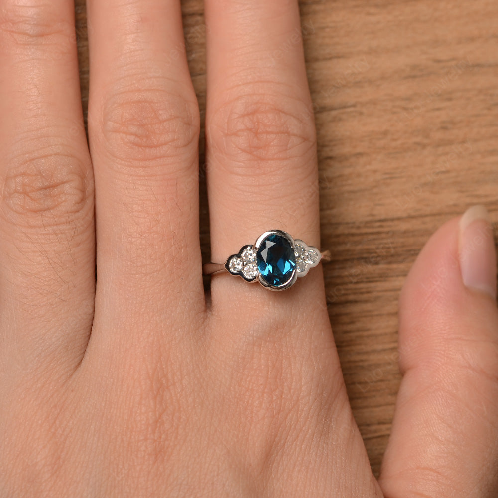 Oval Cut Bezel Set London Blue Topaz Engagement Ring - LUO Jewelry