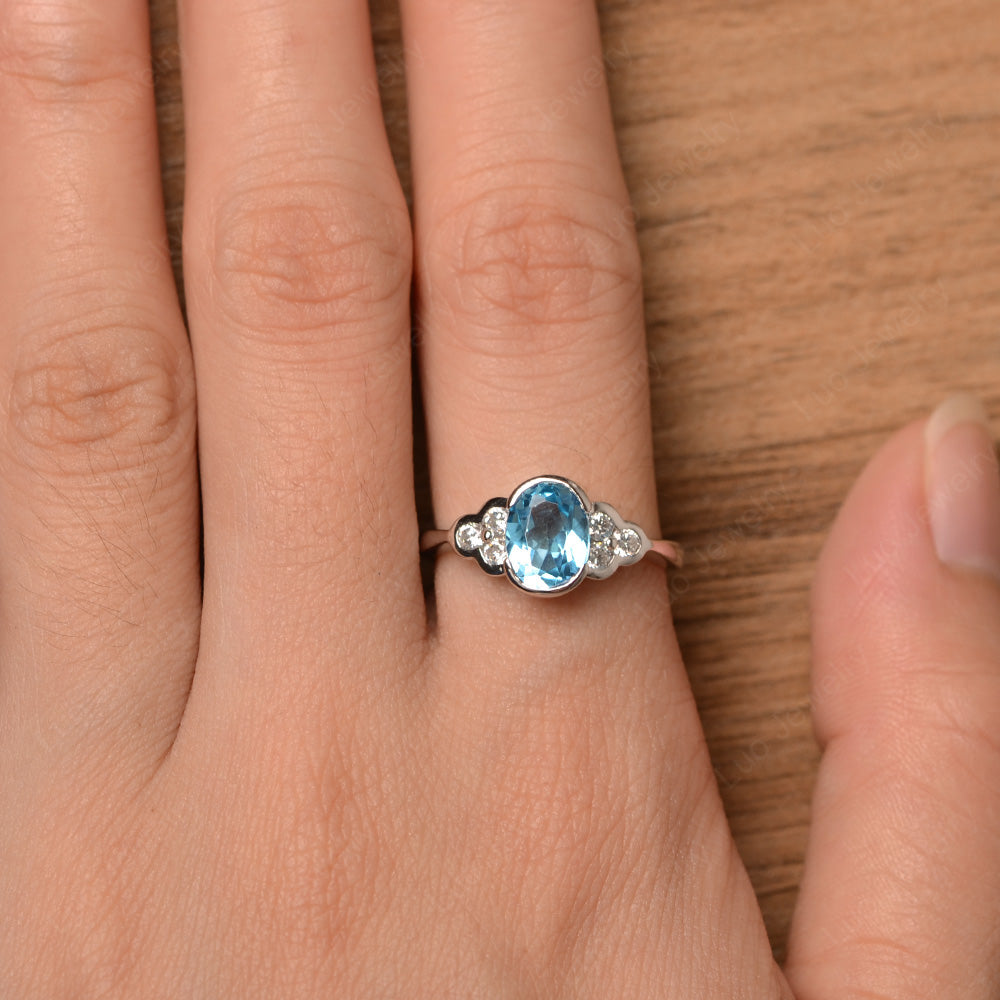 Oval Cut Bezel Set Swiss Blue Topaz Engagement Ring - LUO Jewelry