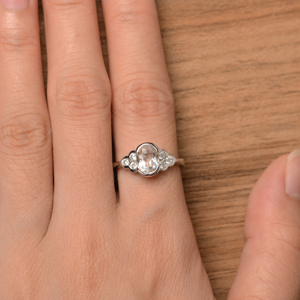 Oval Cut Bezel Set White Topaz Engagement Ring - LUO Jewelry