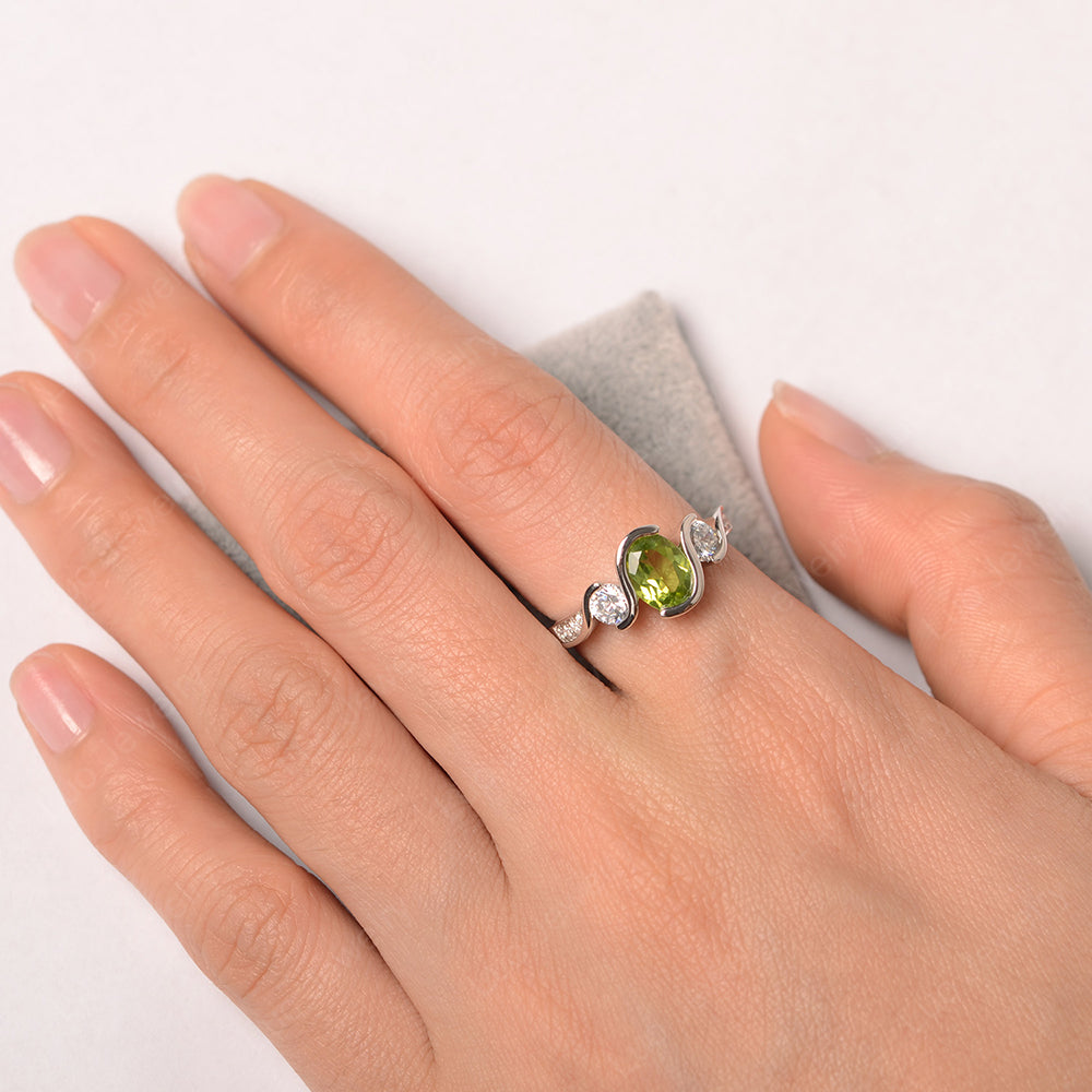 Oval Cut Peridot Bezel Set Ring Yellow Gold - LUO Jewelry