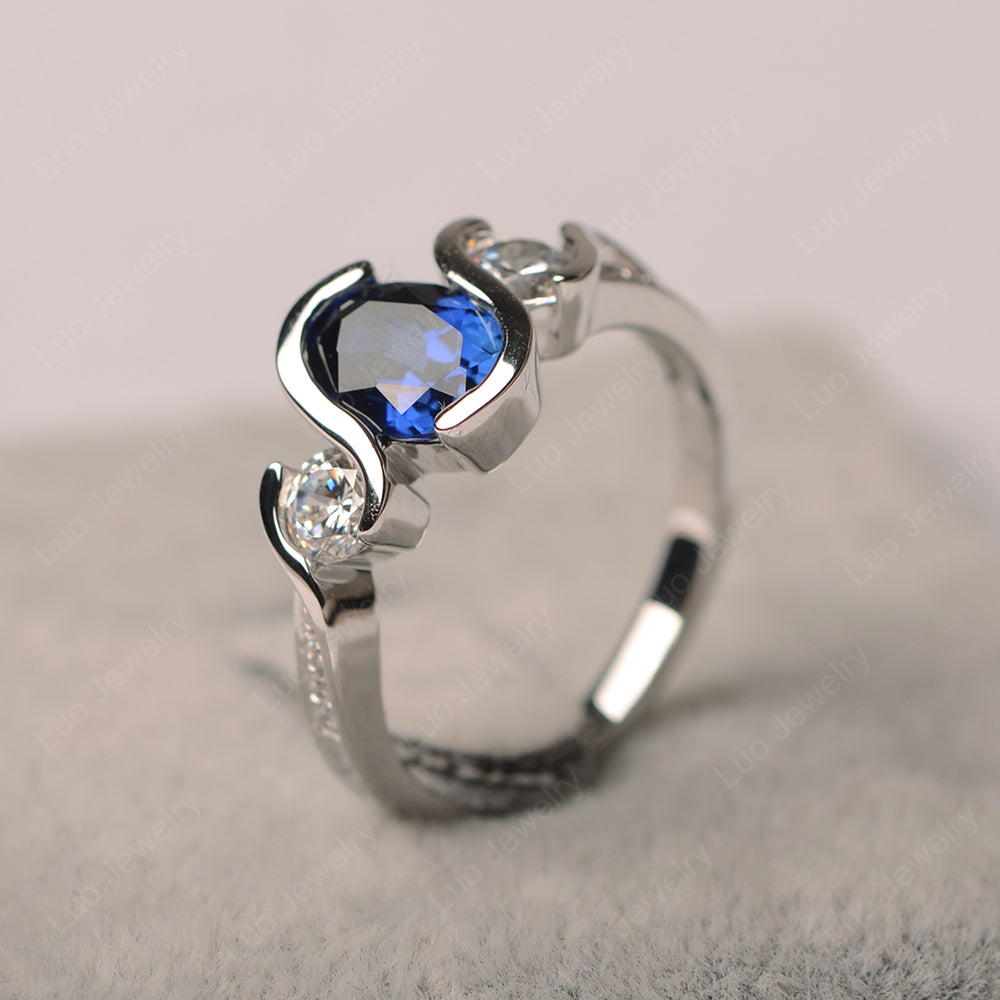Oval Cut Lab Sapphire Bezel Set Ring Yellow Gold - LUO Jewelry