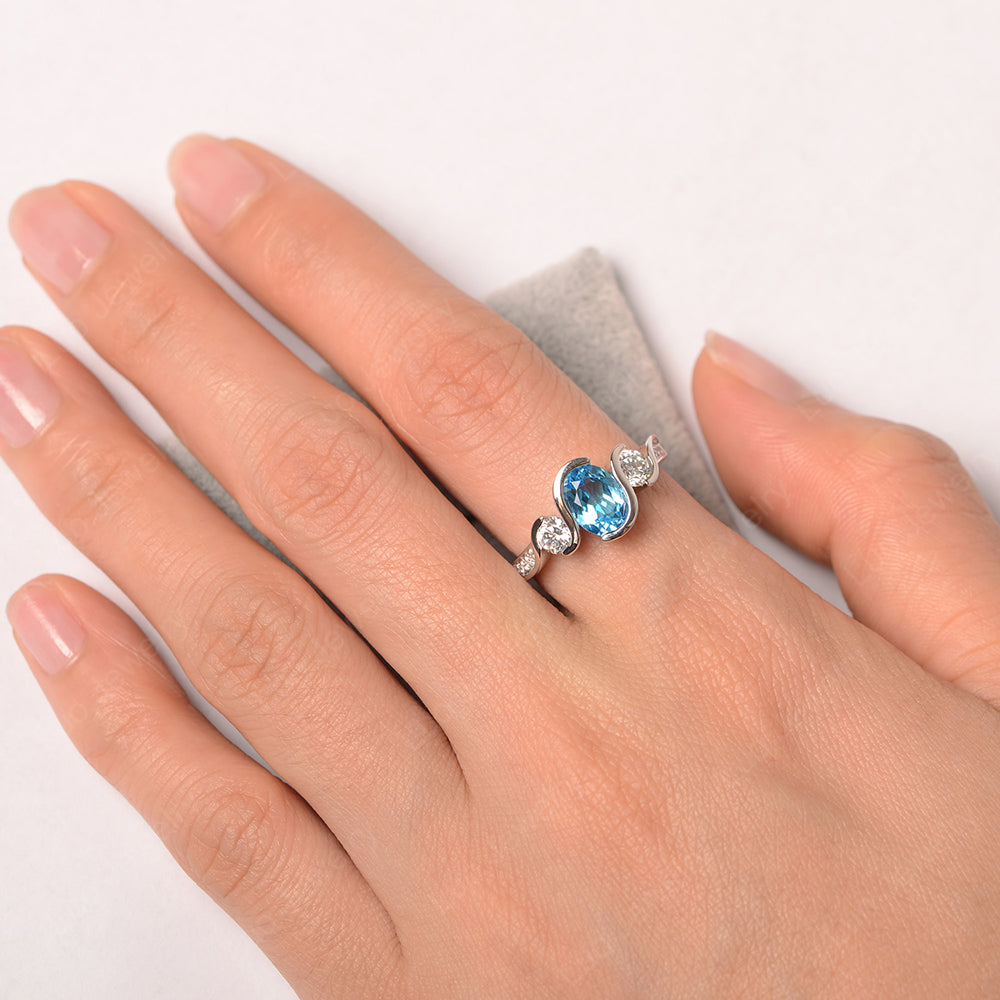 Oval Cut Swiss Blue Topaz Bezel Set Ring Yellow Gold - LUO Jewelry