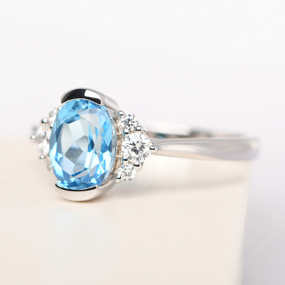 Oval Half Bezel Set Swiss Blue Topaz Engagement Ring - LUO Jewelry