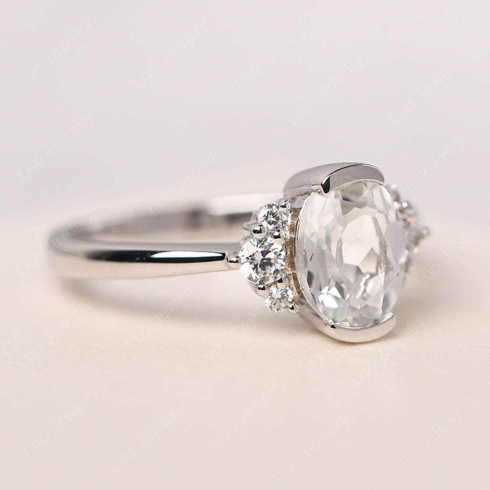 Oval Half Bezel Set White Topaz Engagement Ring - LUO Jewelry