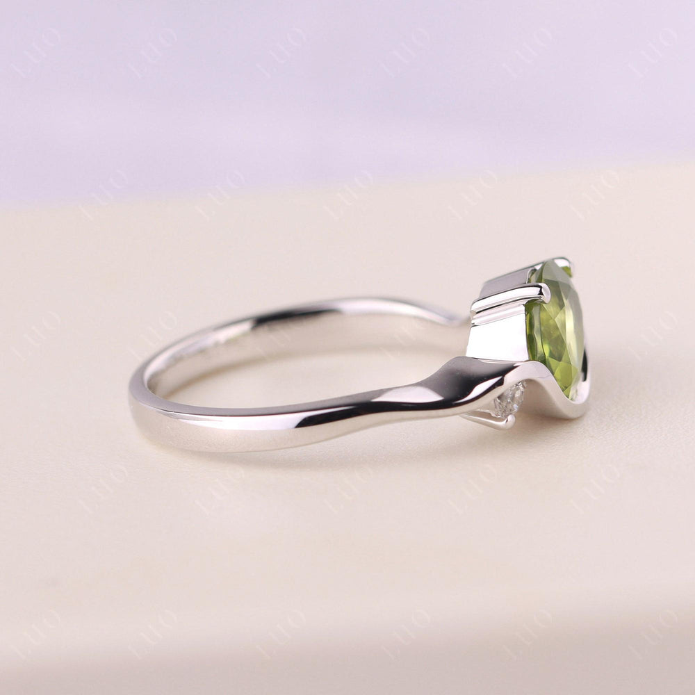 Wave Oval Peridot Engagement Ring