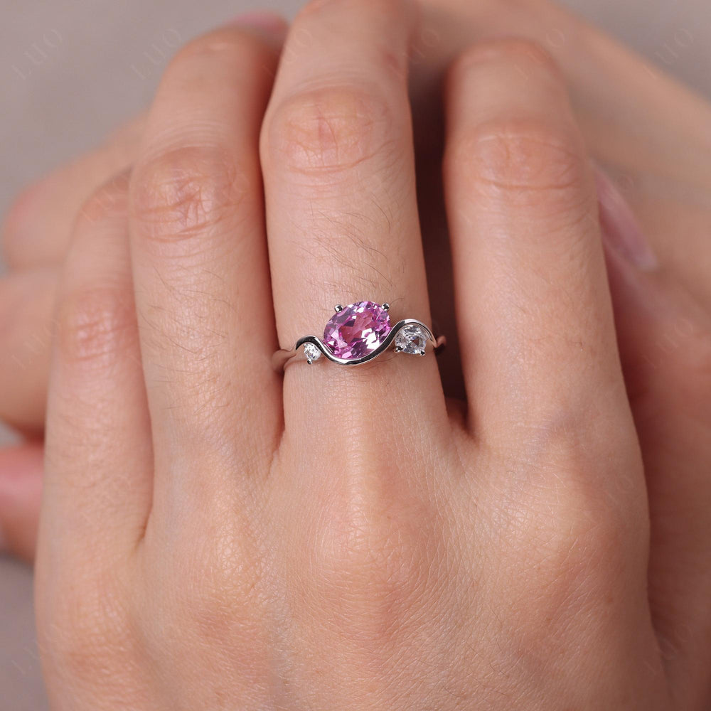 Wave Oval Lab Pink Sapphire Engagement Ring