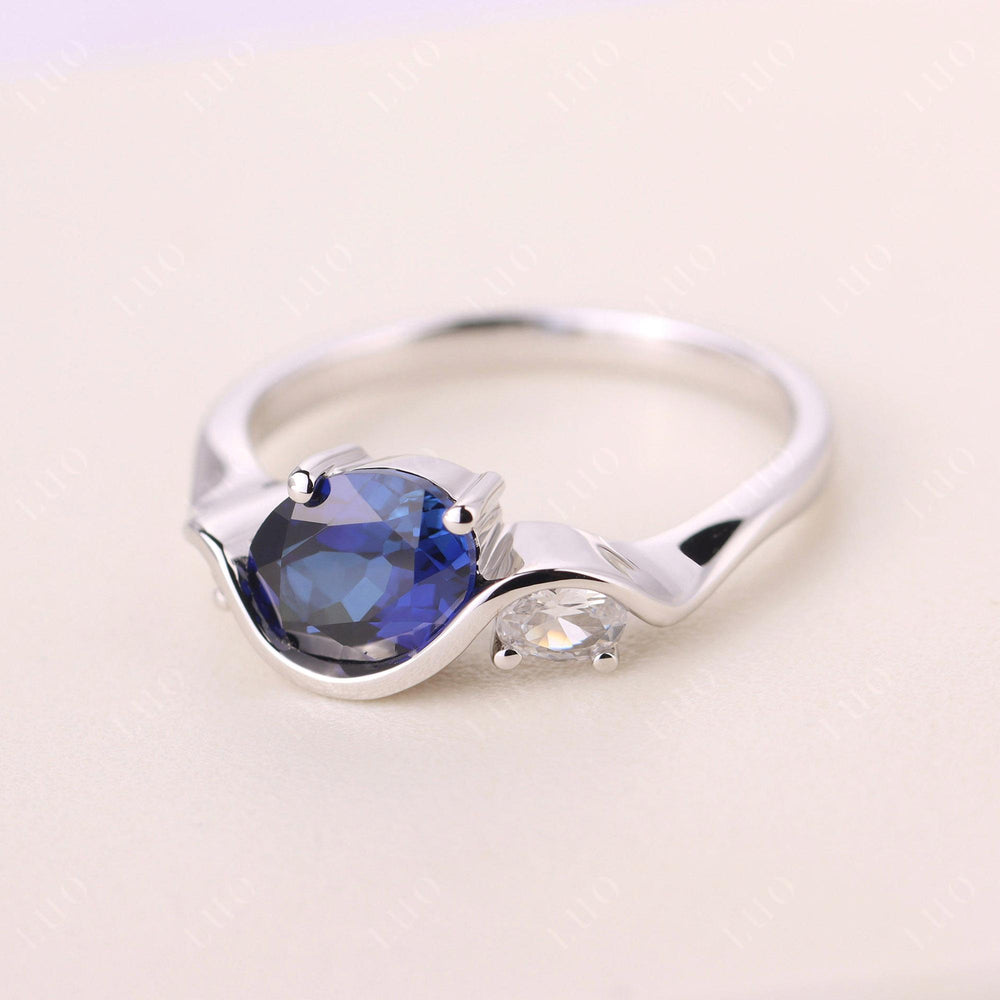 Wave Oval Lab Sapphire Engagement Ring