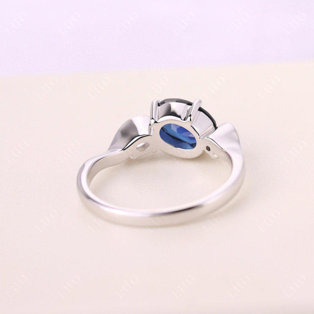 Wave Oval Lab Sapphire Engagement Ring