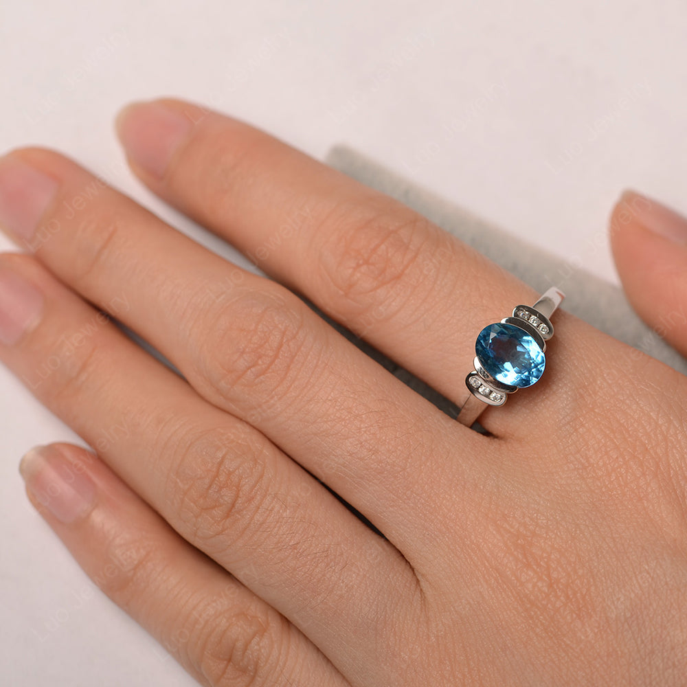 Oval Swiss Blue Topaz Engagement Ring Yellow Gold - LUO Jewelry