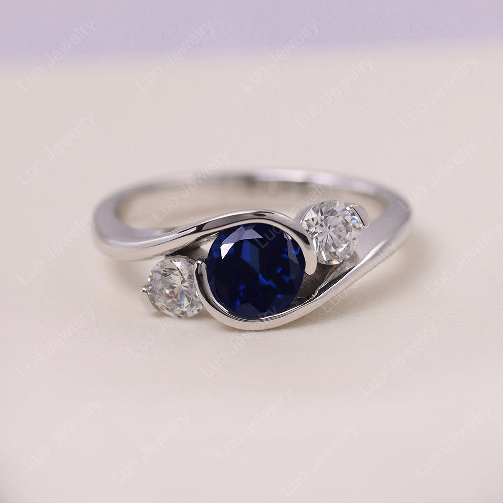 Sapphire Three Stone Bypass Ring