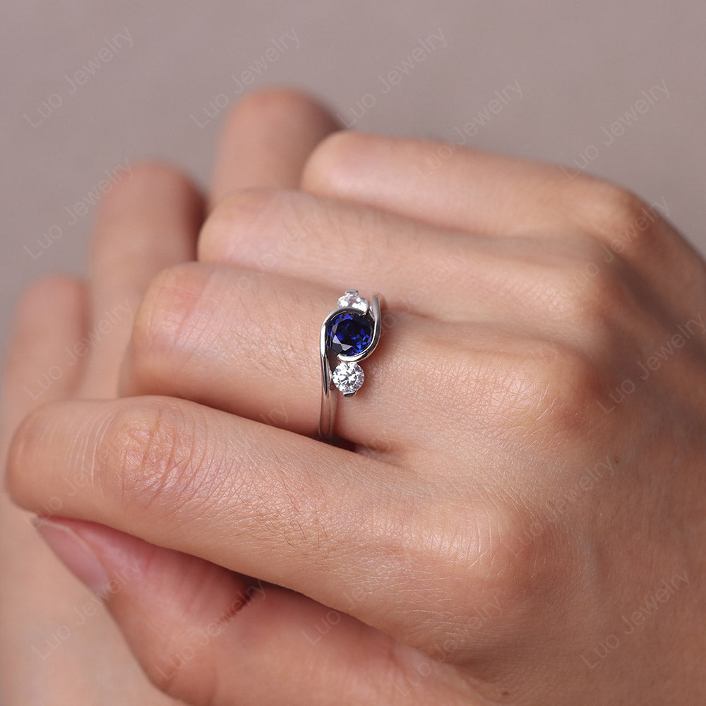 Sapphire Three Stone Bypass Ring